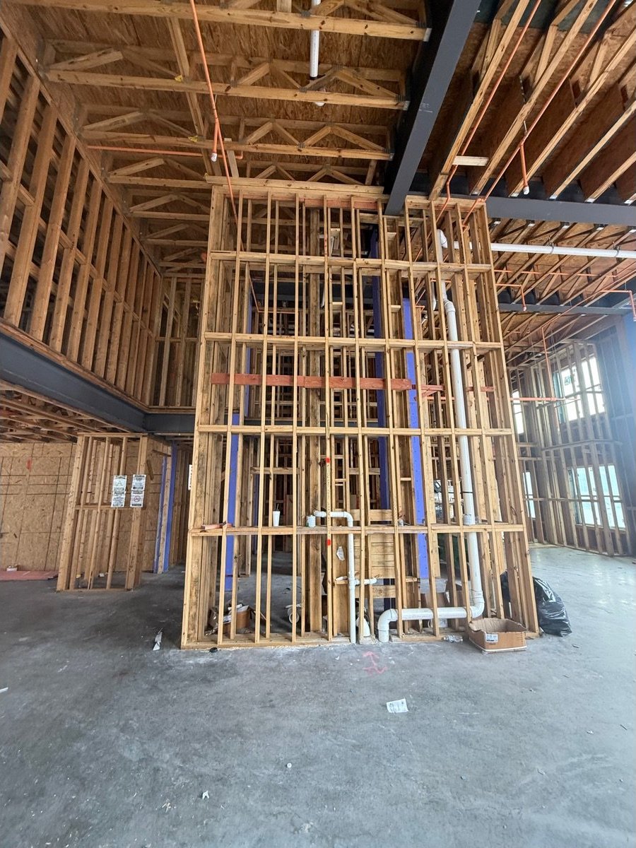 Wood framing inside The Chasen Apartments under construction in Richmond, Virginia, during a Prescient Environmental framing assessment