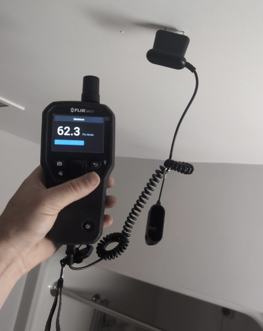 Pinless moisture meter reading on a wall at MedStar Georgetown University Hospital