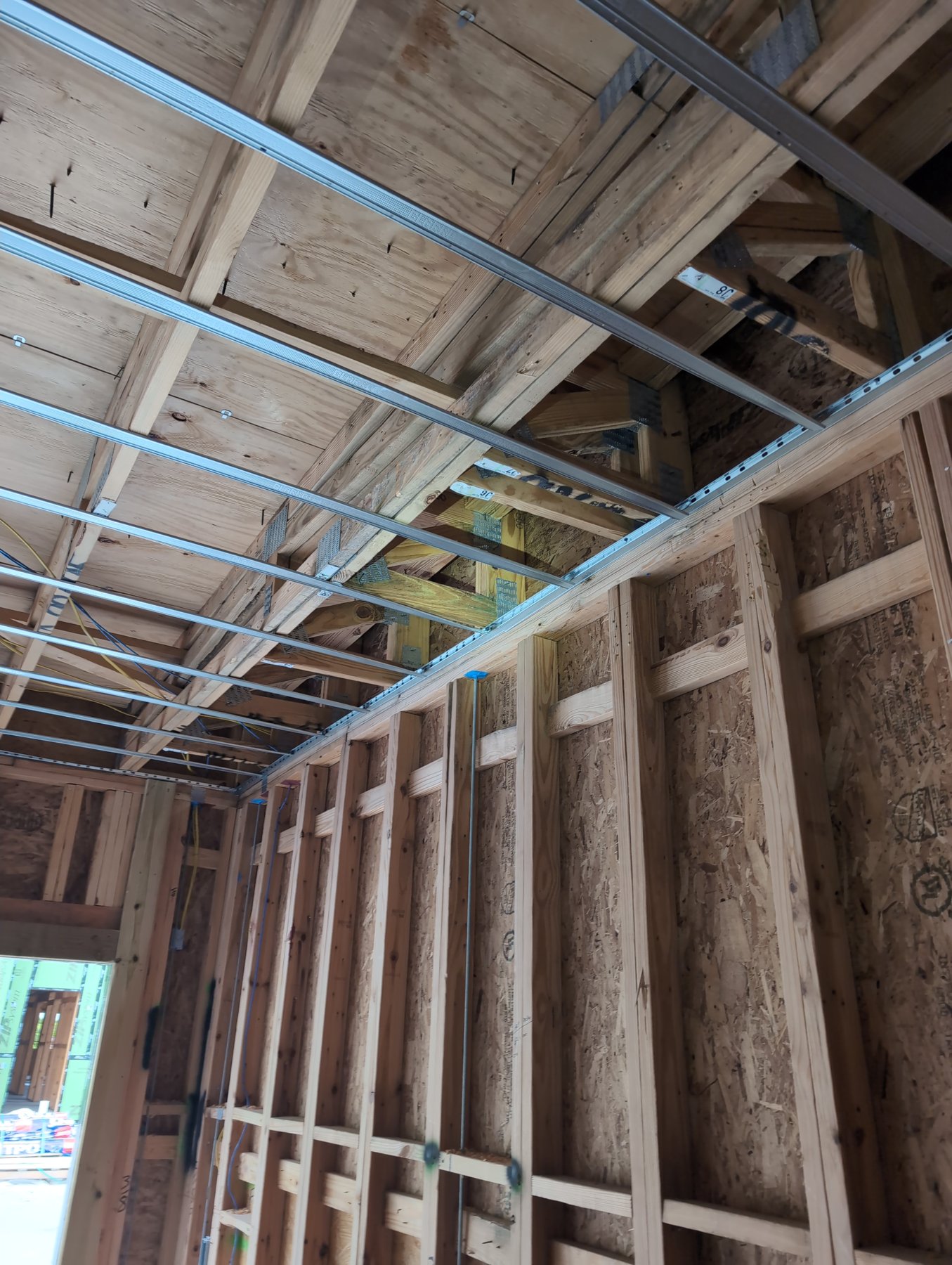 Wood framing and ceiling joists at The Vivien in Vero Beach, Florida, during a Prescient Environmental framing moisture assessment